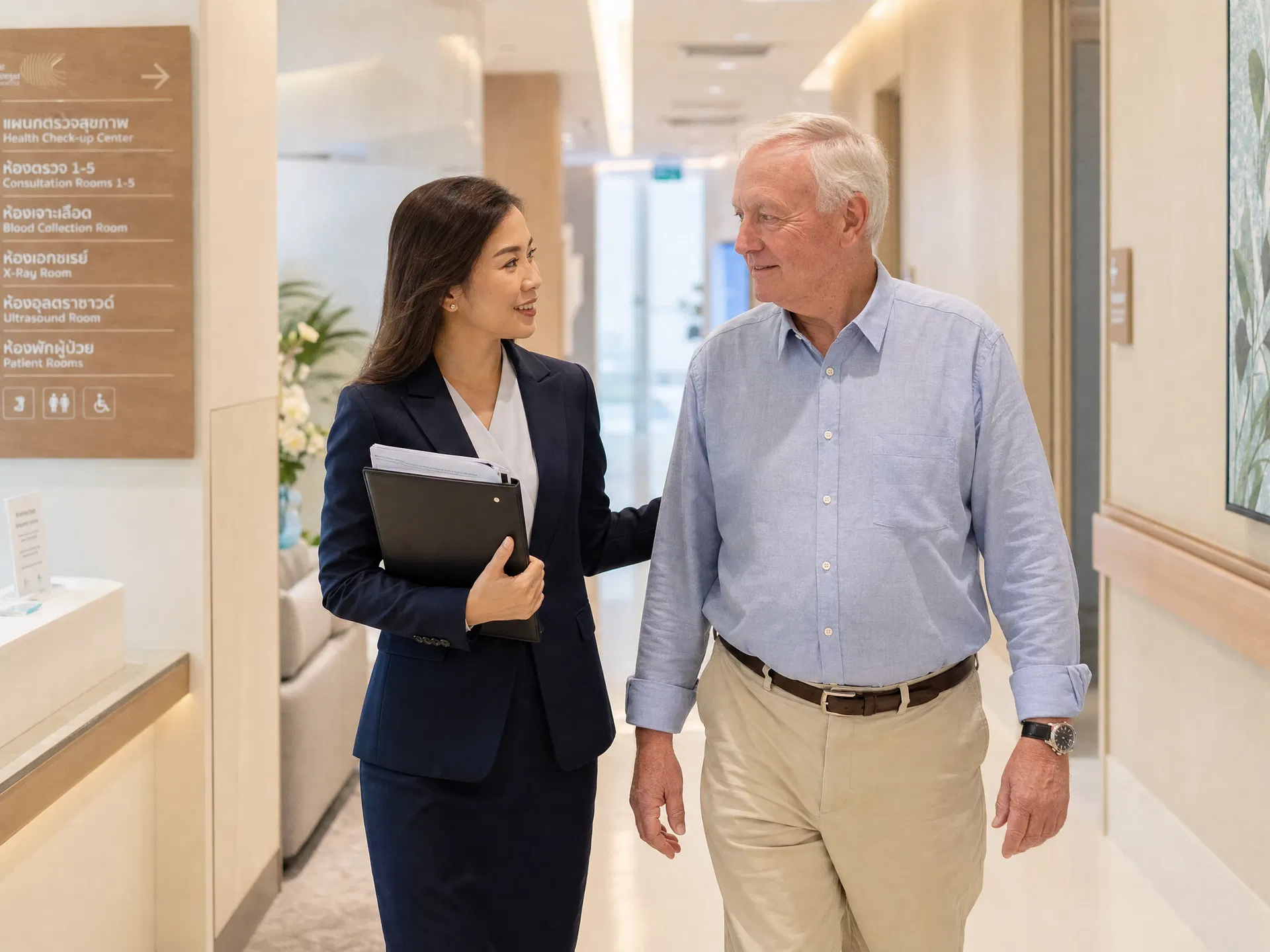 Thai-English advocate accompanying a retiree at a Hua Hin hospital